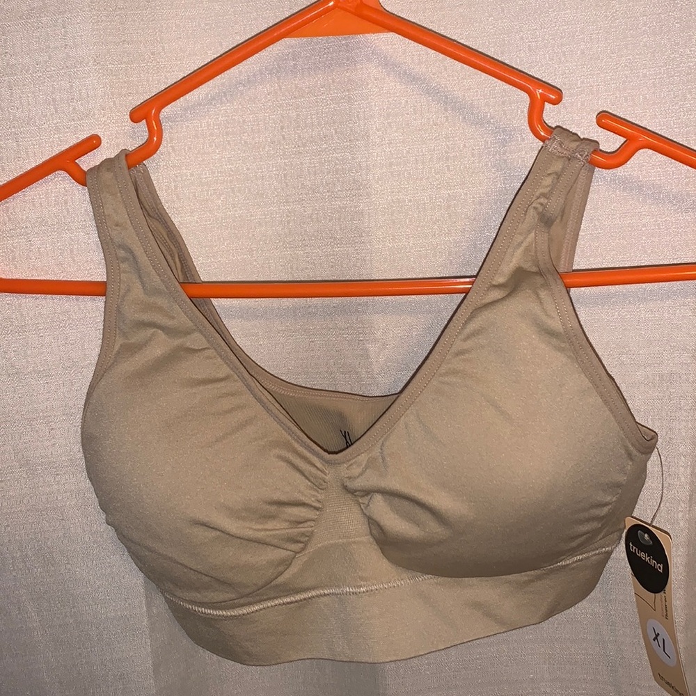 New with tags- lightly padded, bra. Size XL no up size
